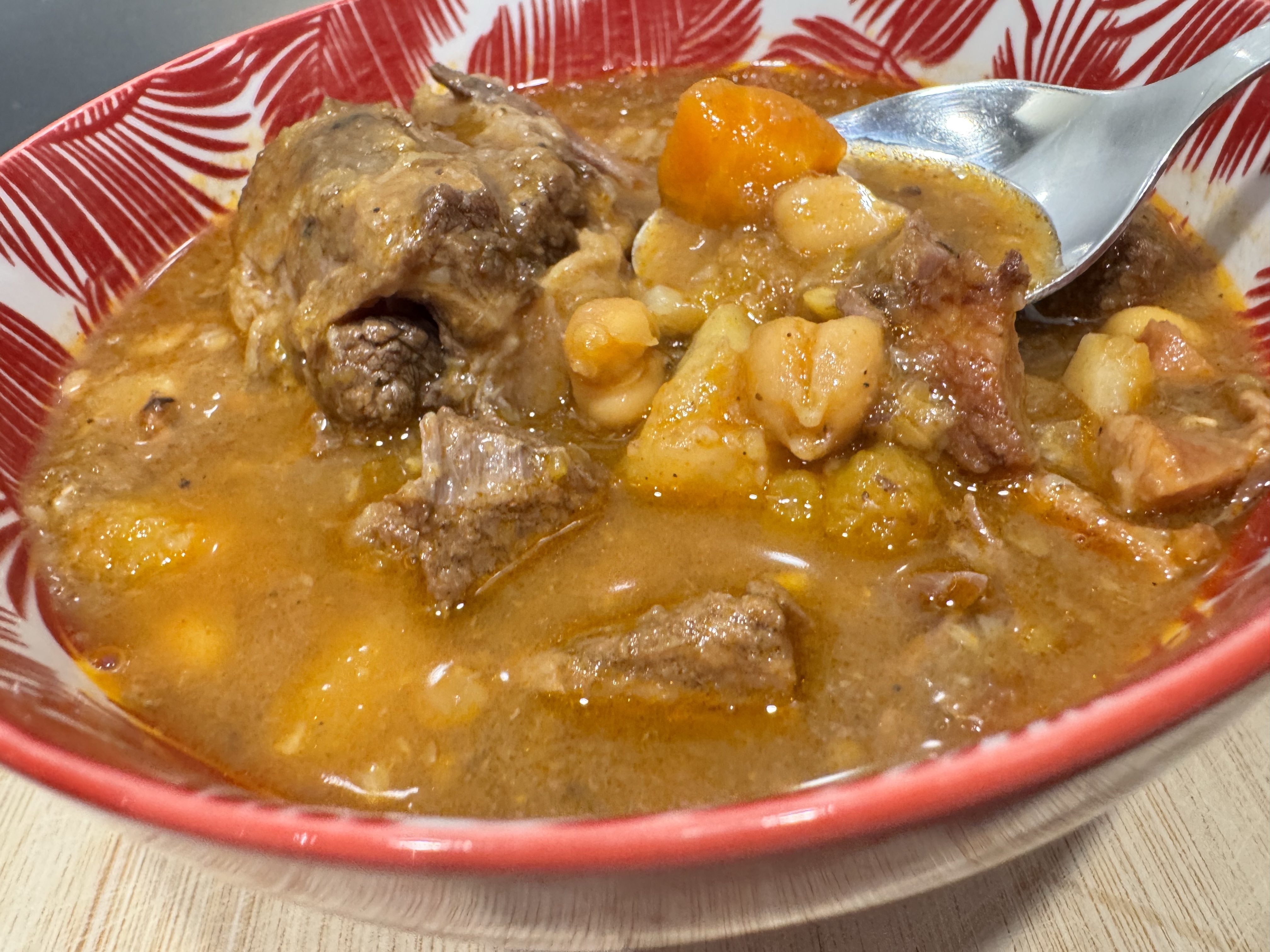 Oxtail and Slow-Cooked Beef Soup with Root Vegetables, Butternut Squash, and Legumes